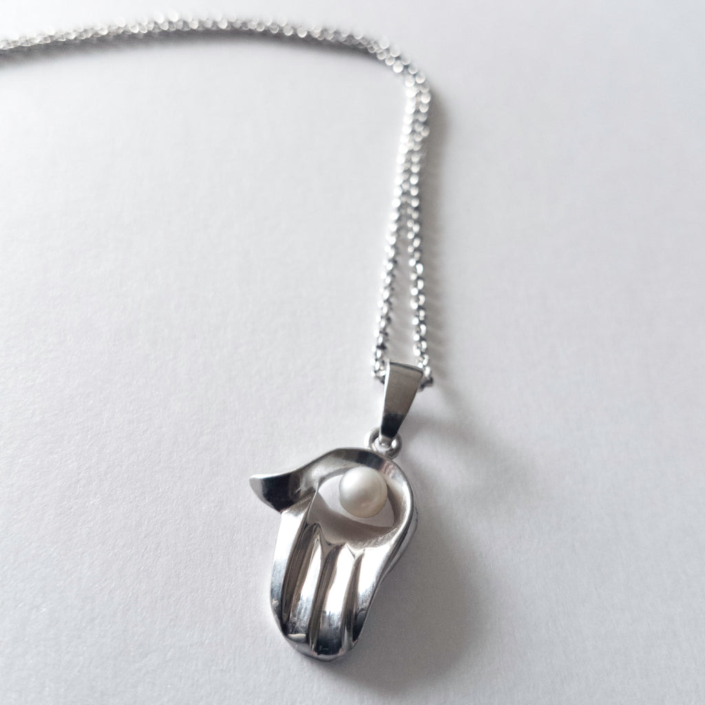 Hamsa with a Pearl Necklace