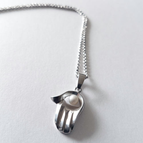 Hamsa with a Pearl Necklace
