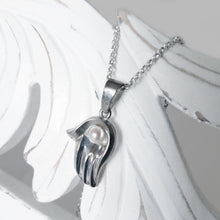 Hamsa with a Pearl Necklace